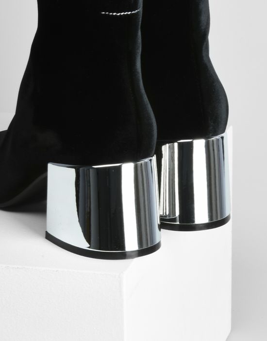 black boots with metallic heel