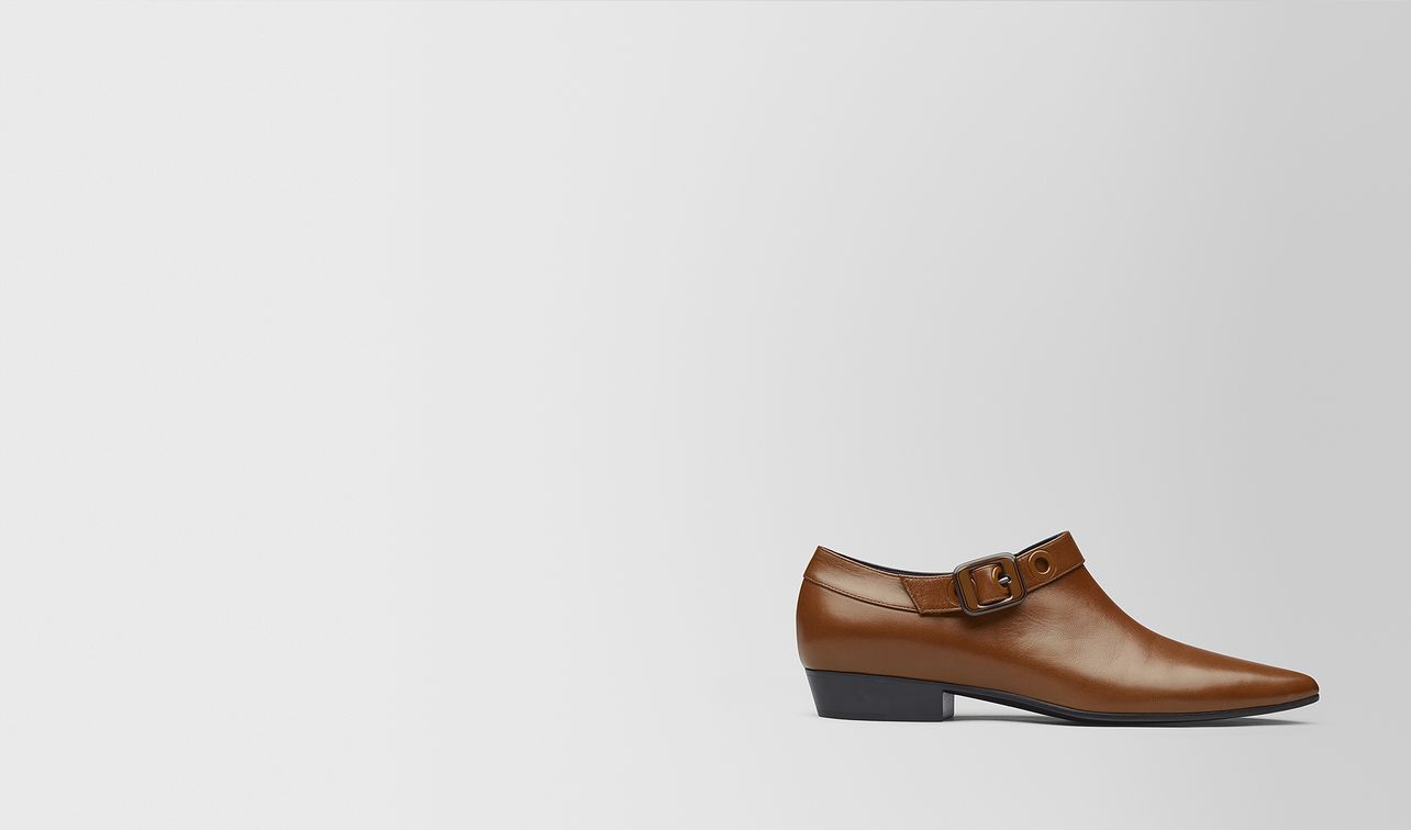 dark leather kid moodec ankle boot
landing