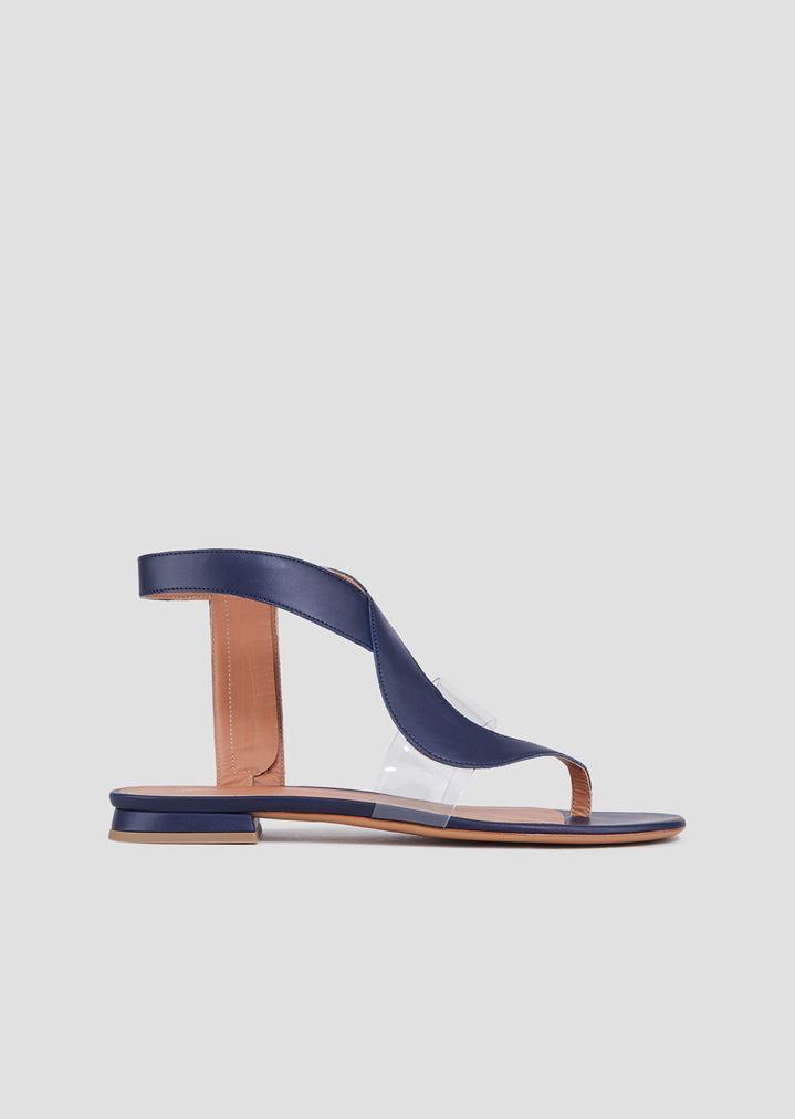 Flat thong sandals in leather and vinyl Flat thong sandals in leather and vinyl