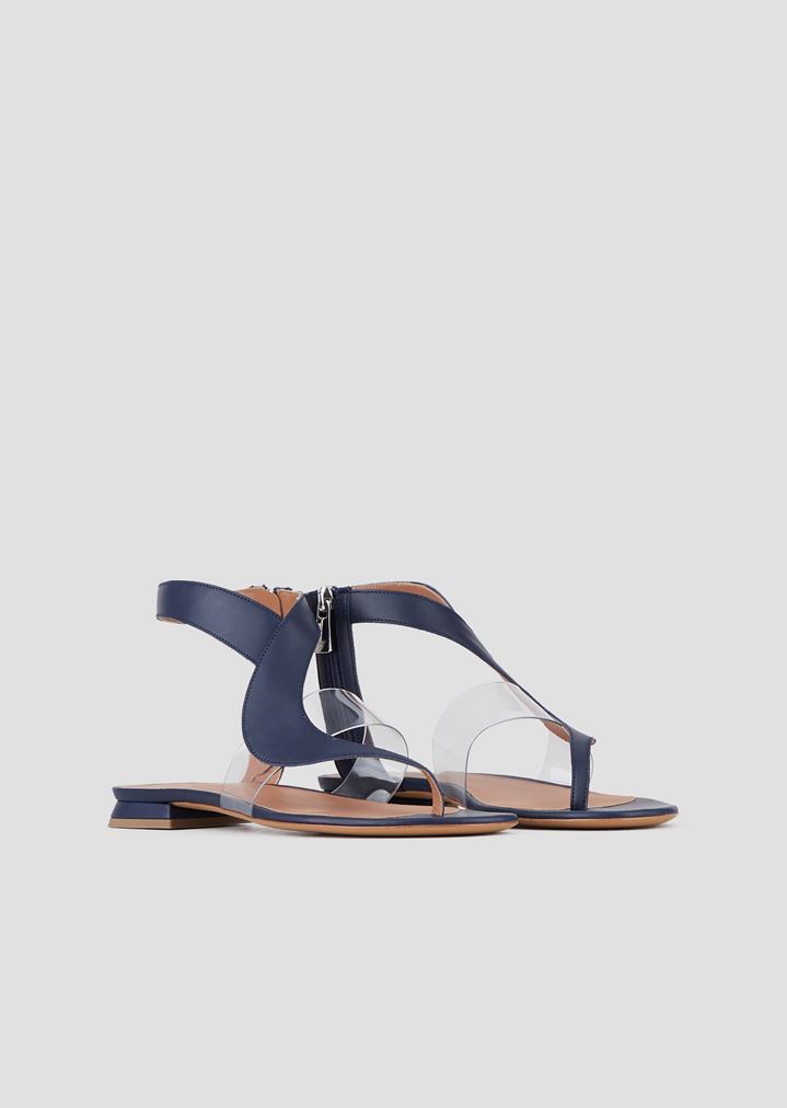 Flat thong sandals in leather and vinyl Flat thong sandals in leather and vinyl