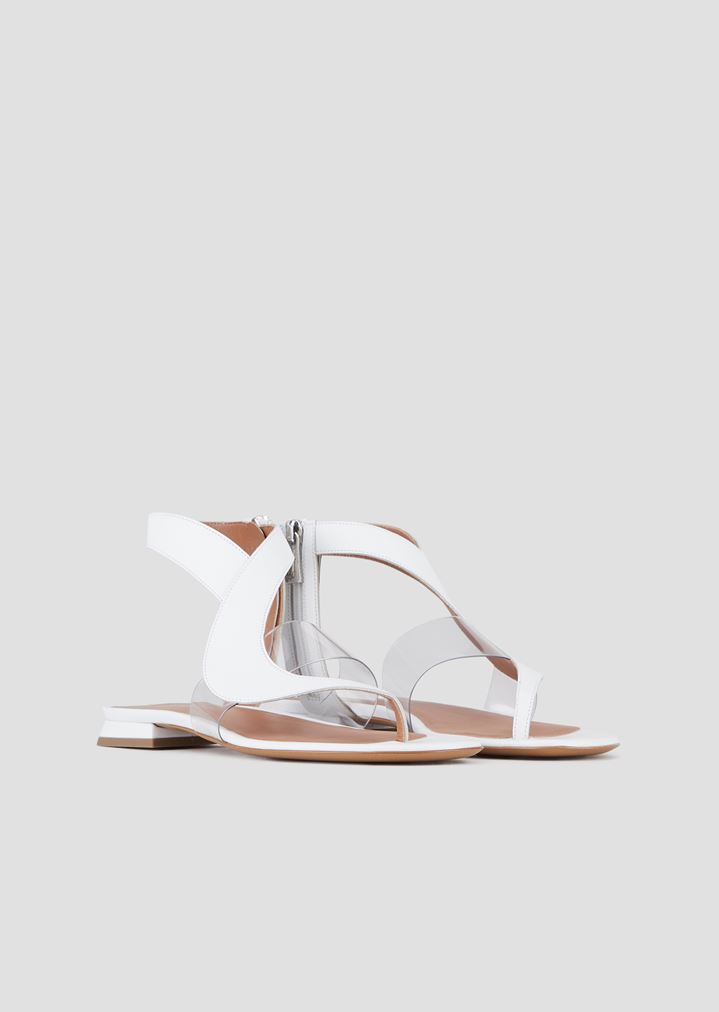 Flat thong sandals in leather and vinyl Flat thong sandals in leather and vinyl