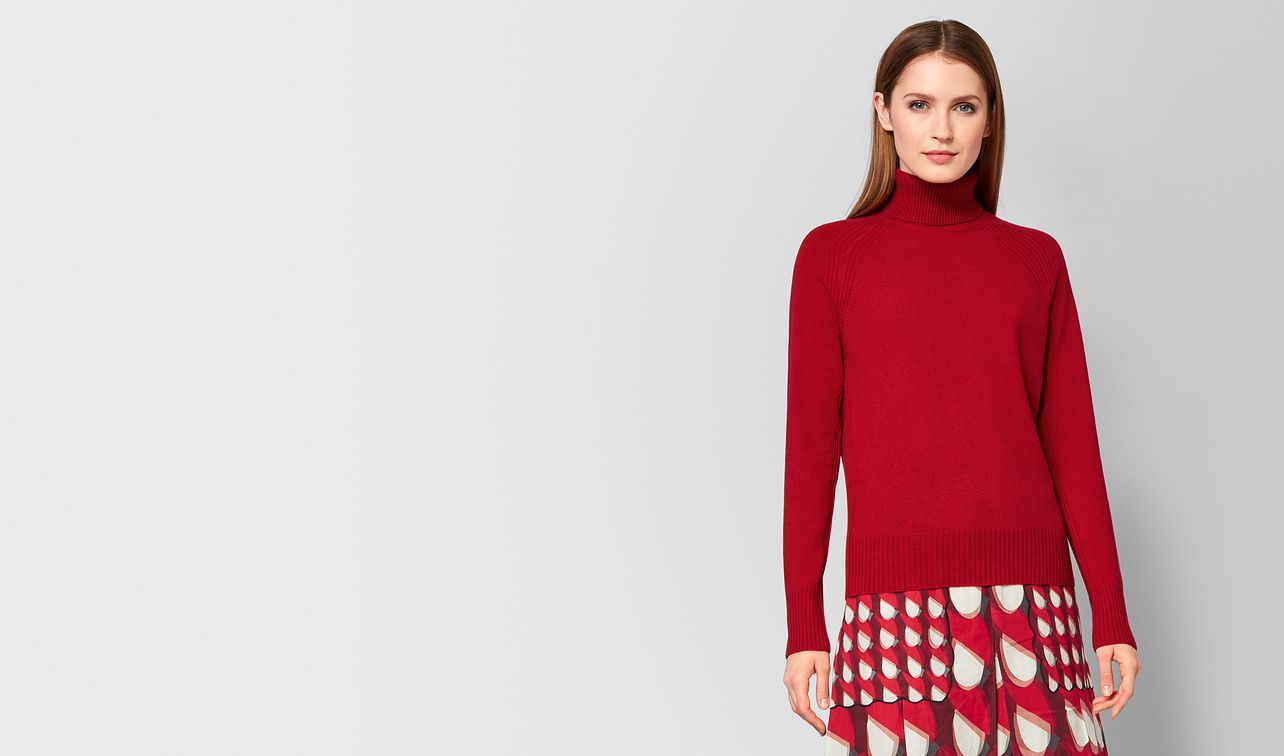 red cashmere sweater landing