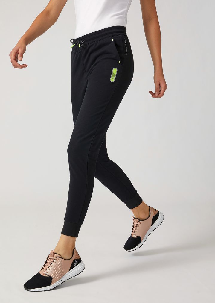 Pantalones deportivos de felpa con logotipo en la parte posterior Pantalones deportivos de felpa con logotipo en la parte posterior