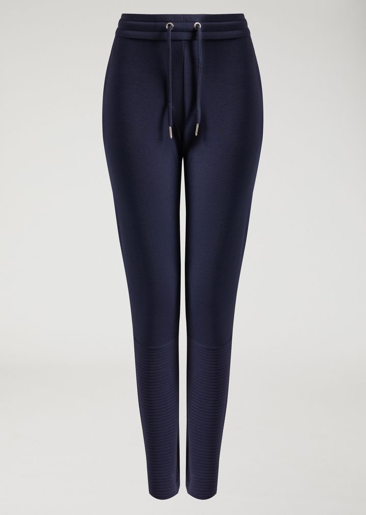 Pantalones deportivos de felpa con logotipo en la parte posterior Pantalones deportivos de felpa con logotipo en la parte posterior