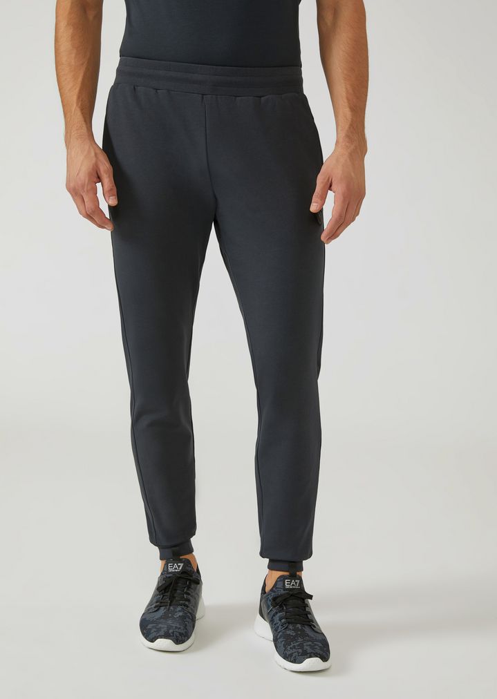 Pantalones deportivos de algodón perchado elástico Pantalones deportivos de algodón perchado elástico