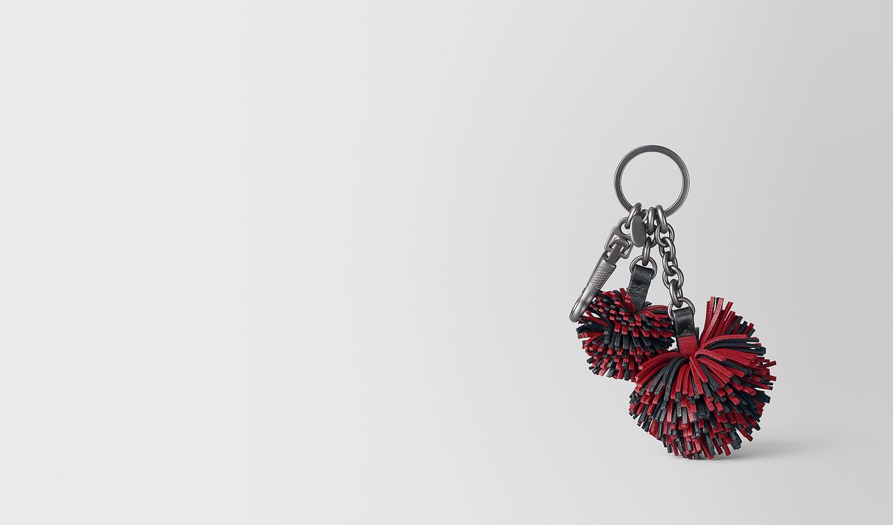 china red nappa pom-pom landing