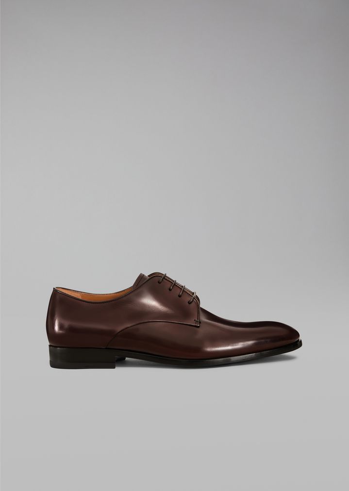 Mocasines de piel con detalle de logotipo Mocasines de piel con detalle de logotipo