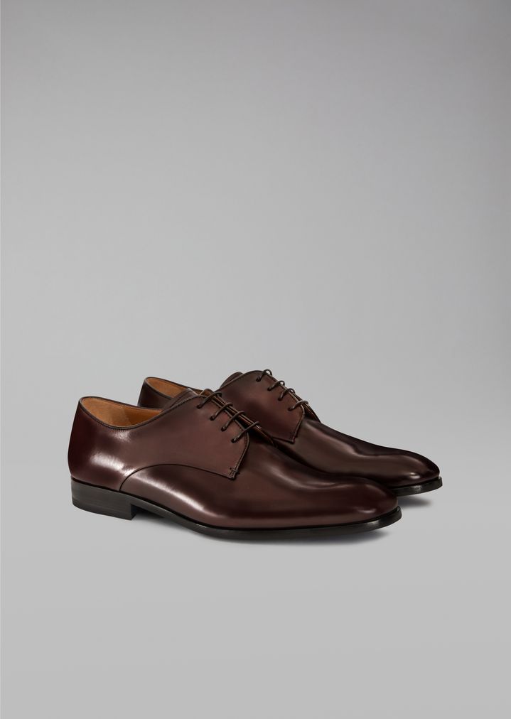 Mocasines de piel con detalle de logotipo Mocasines de piel con detalle de logotipo