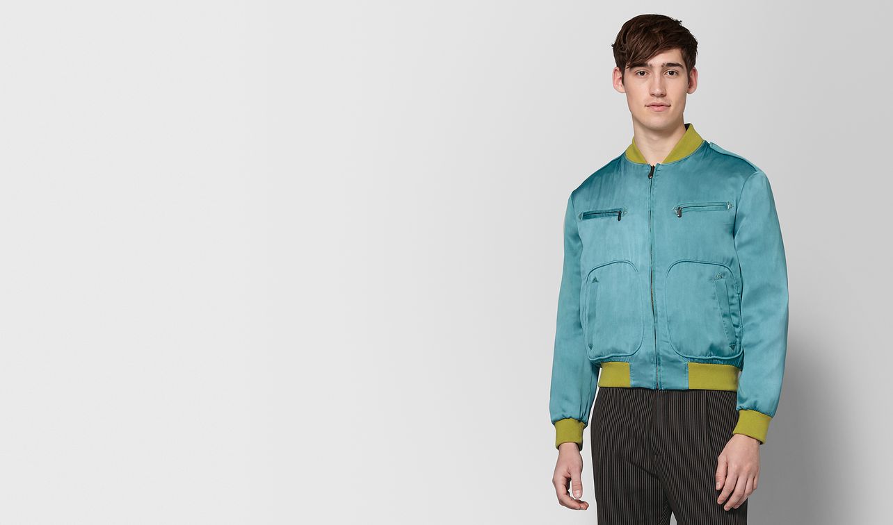 light aqua silk jacket landing