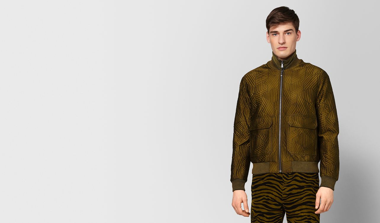 dark orange silk jacket landing