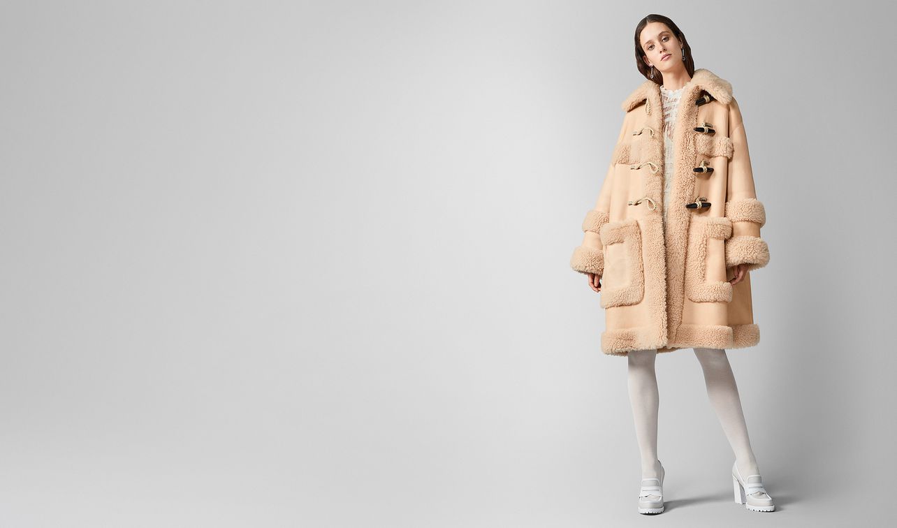 coat in shearling landing