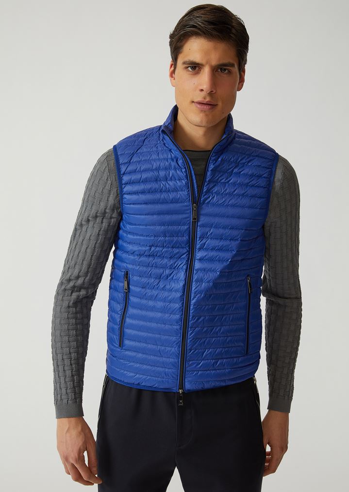 Plumífero de tejido técnico sin mangas Plumífero de tejido técnico sin mangas