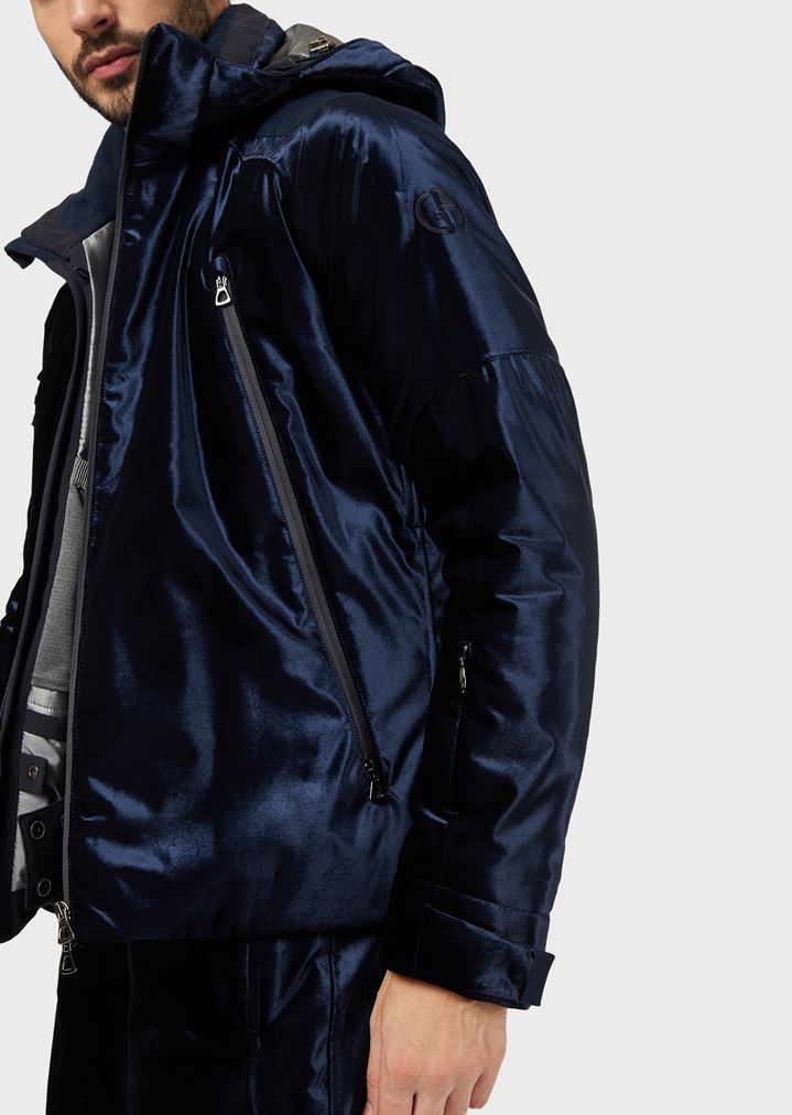 Technical padded ski jacket with outer shell in waterrepellent velvet