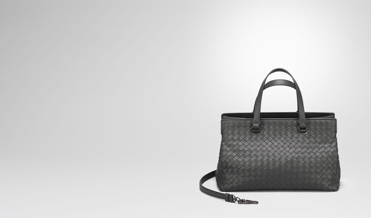 medium top handle bag in new light grey intrecciato nappa landing