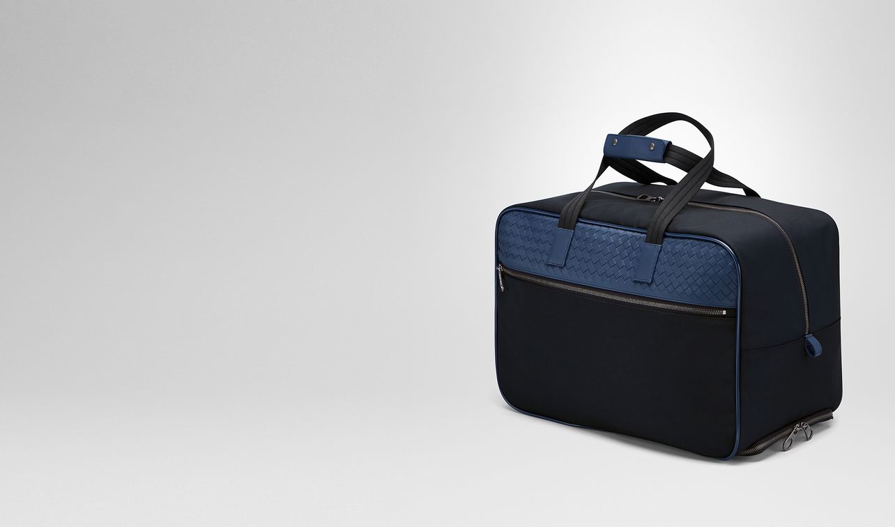 travel bag in tourmaline technical canvas and pacific intrecciato calf landing
