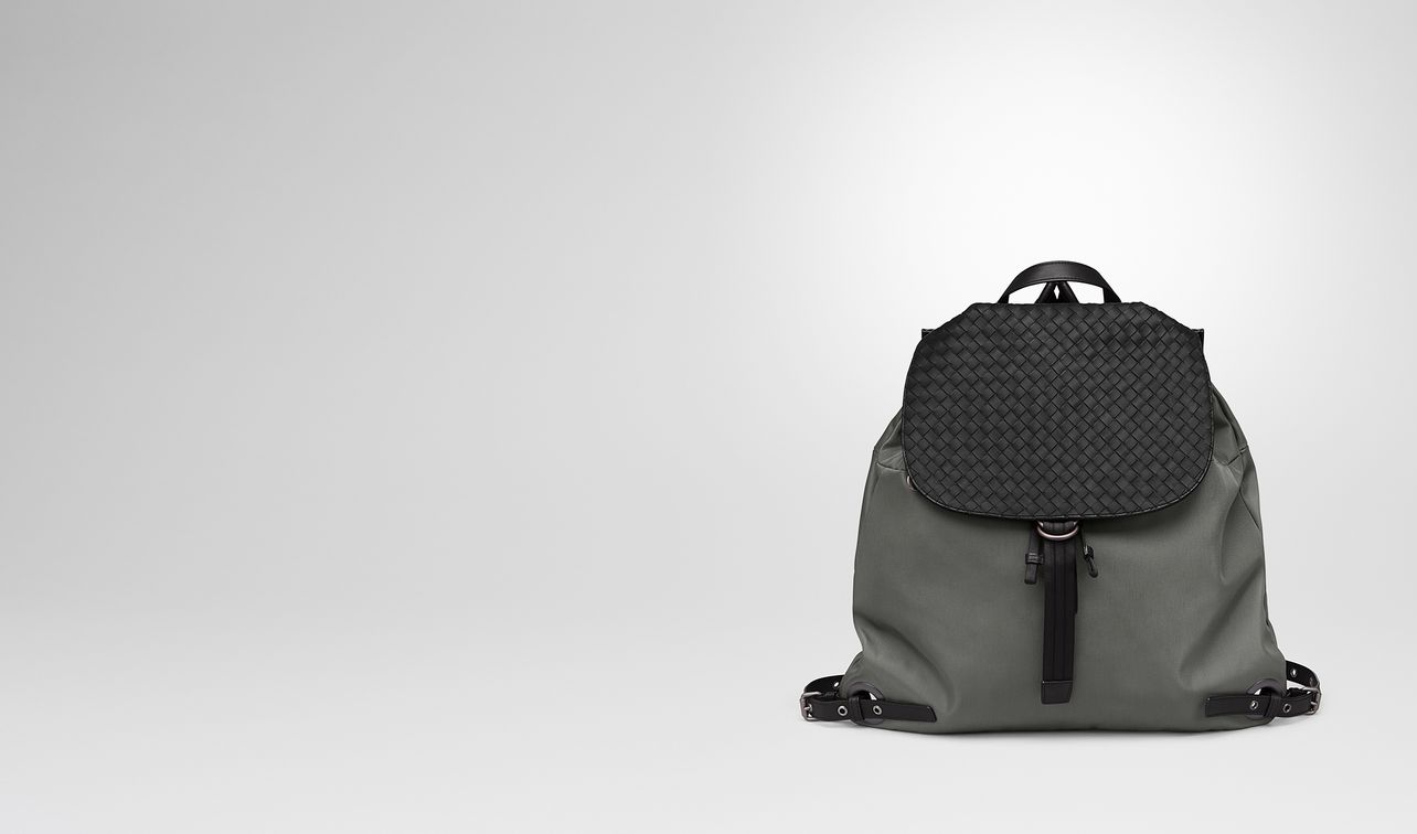 light gray technical canvas backpack landing