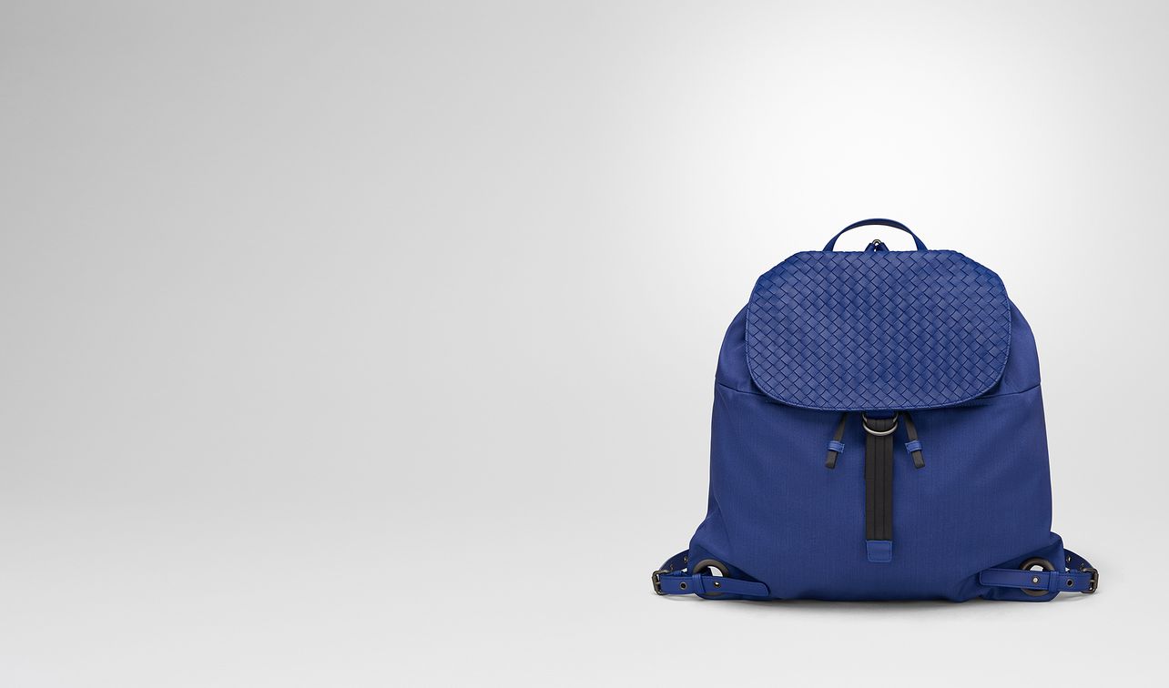 cobalt blue canvas backpack landing