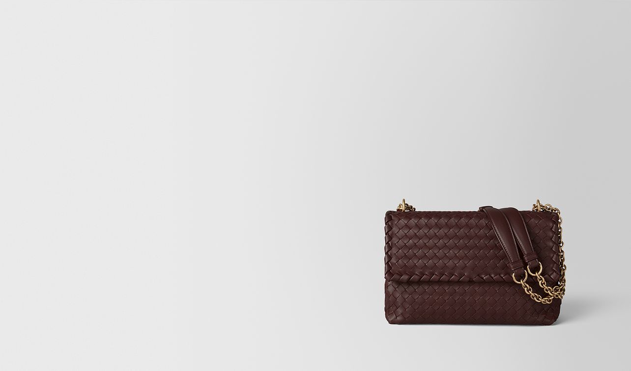 dark barolo intrecciato nappa small olimpia bag landing