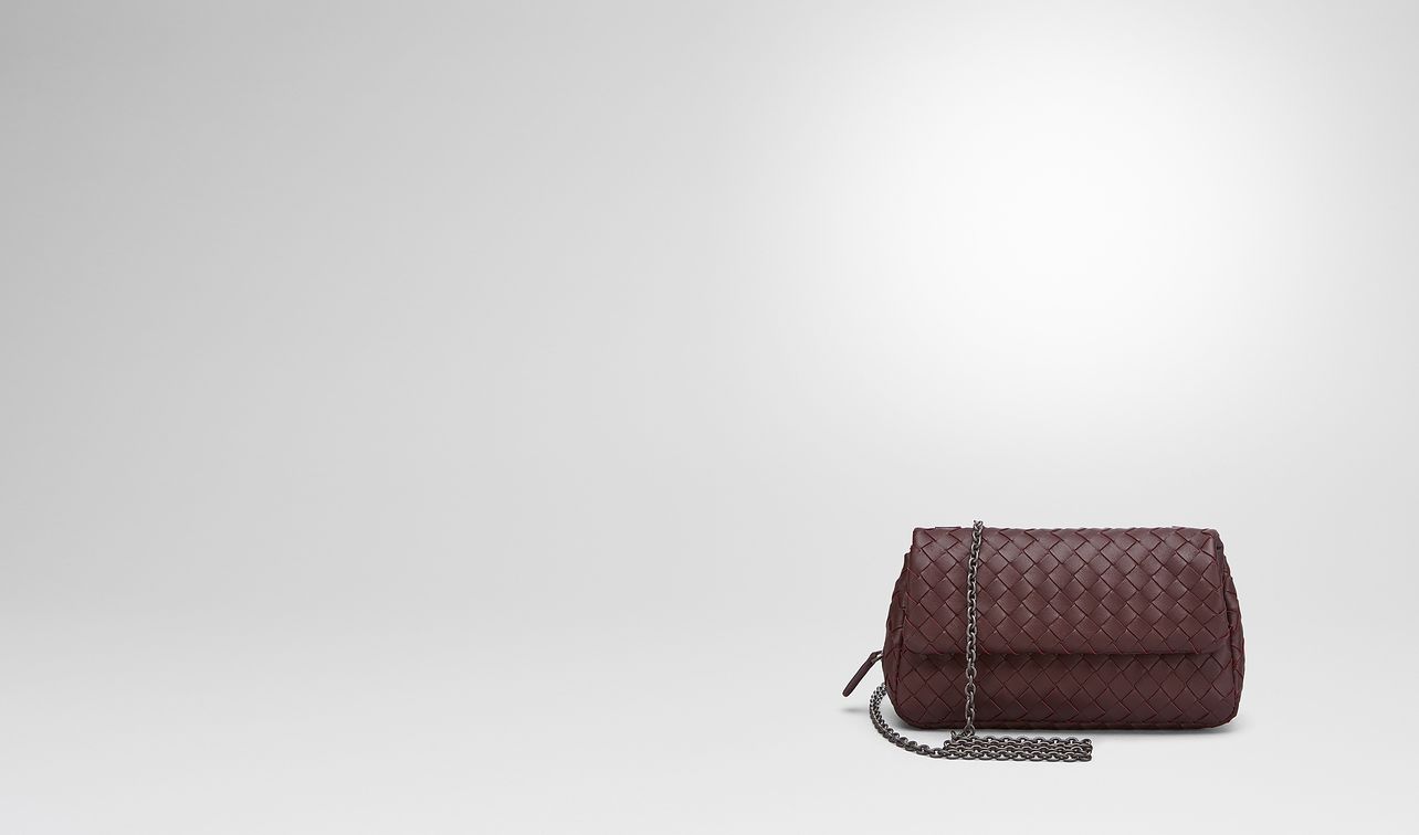 dark barolo intrecciato nappa mini messenger bag landing