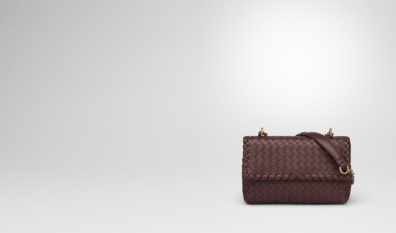 dark barolo intrecciato nappa baby olimpia bag landing