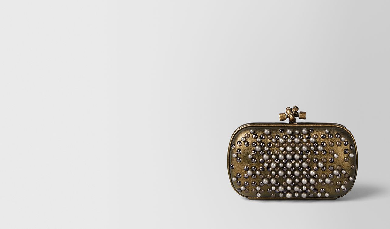 dark gold spheres knot
landing