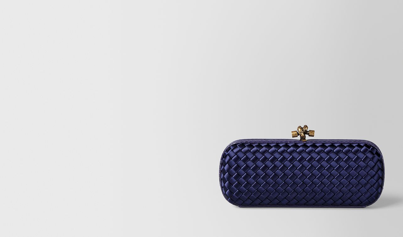 atlantic intrecciato impero stretch knot clutch landing