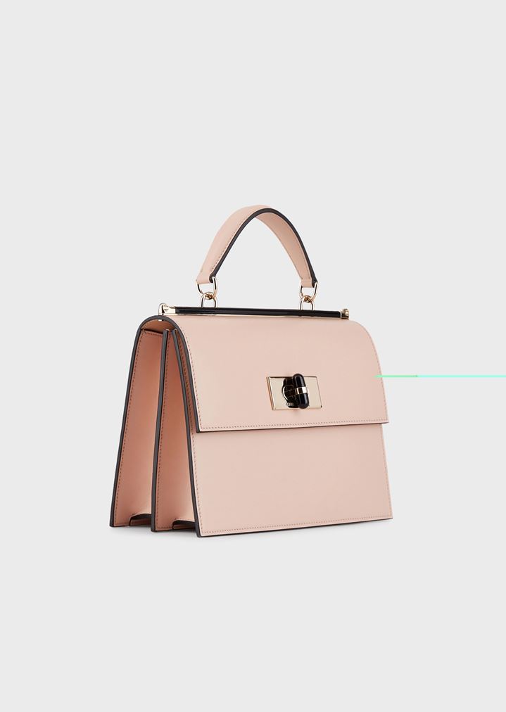 Bolso de mano de piel lisa con cierre giratorio y detalles de plexiglás Bolso de mano de piel lisa con cierre giratorio y detalles de plexiglás