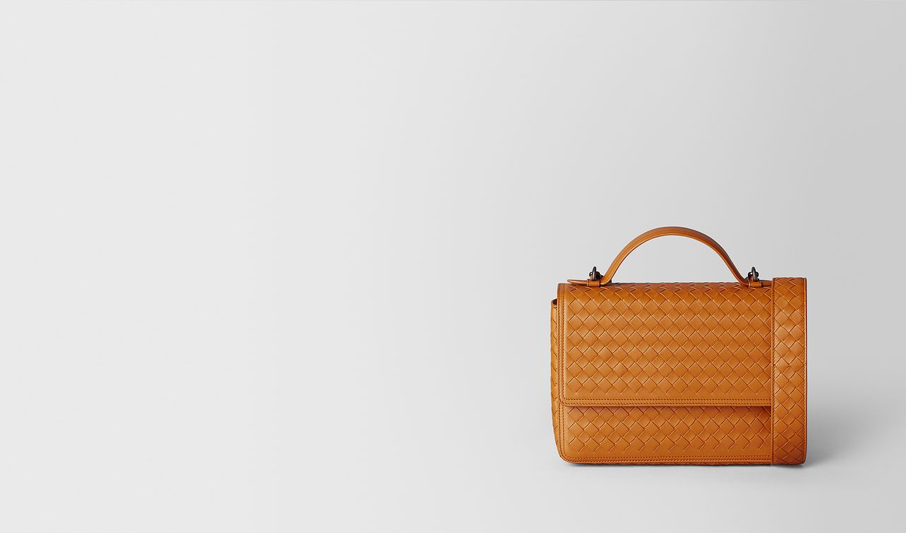 alumna tasche aus intrecciato nappa in orange landing