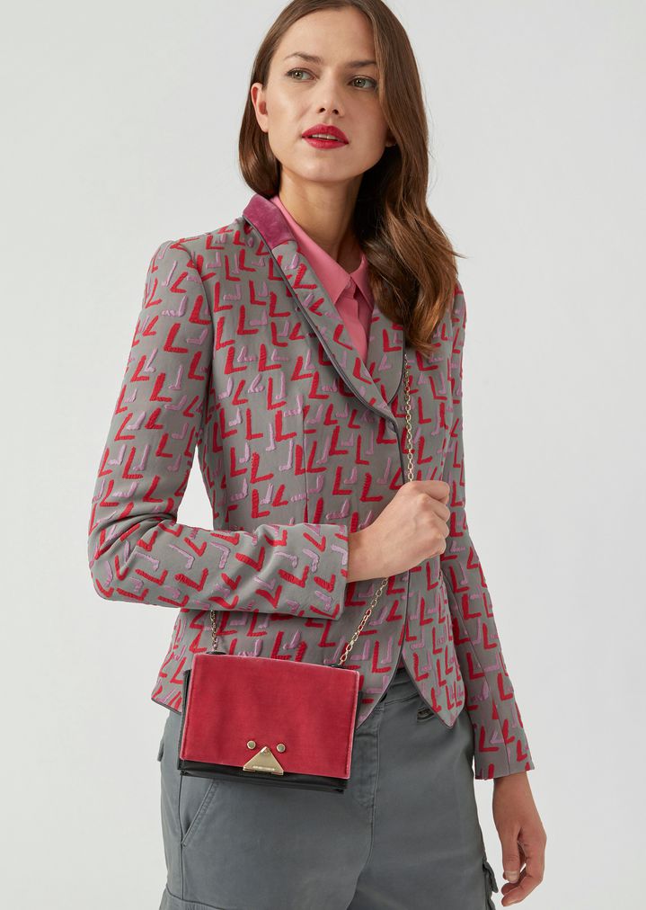 Minibolso de terciopelo y piel con cierre triangular Minibolso de terciopelo y piel con cierre triangular