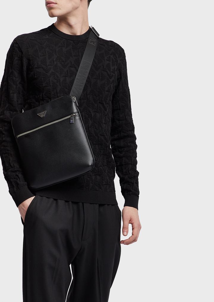 Flat bag in faux leather with adjustable, logoed strap Flat bag in faux leather with adjustable, logoed strap