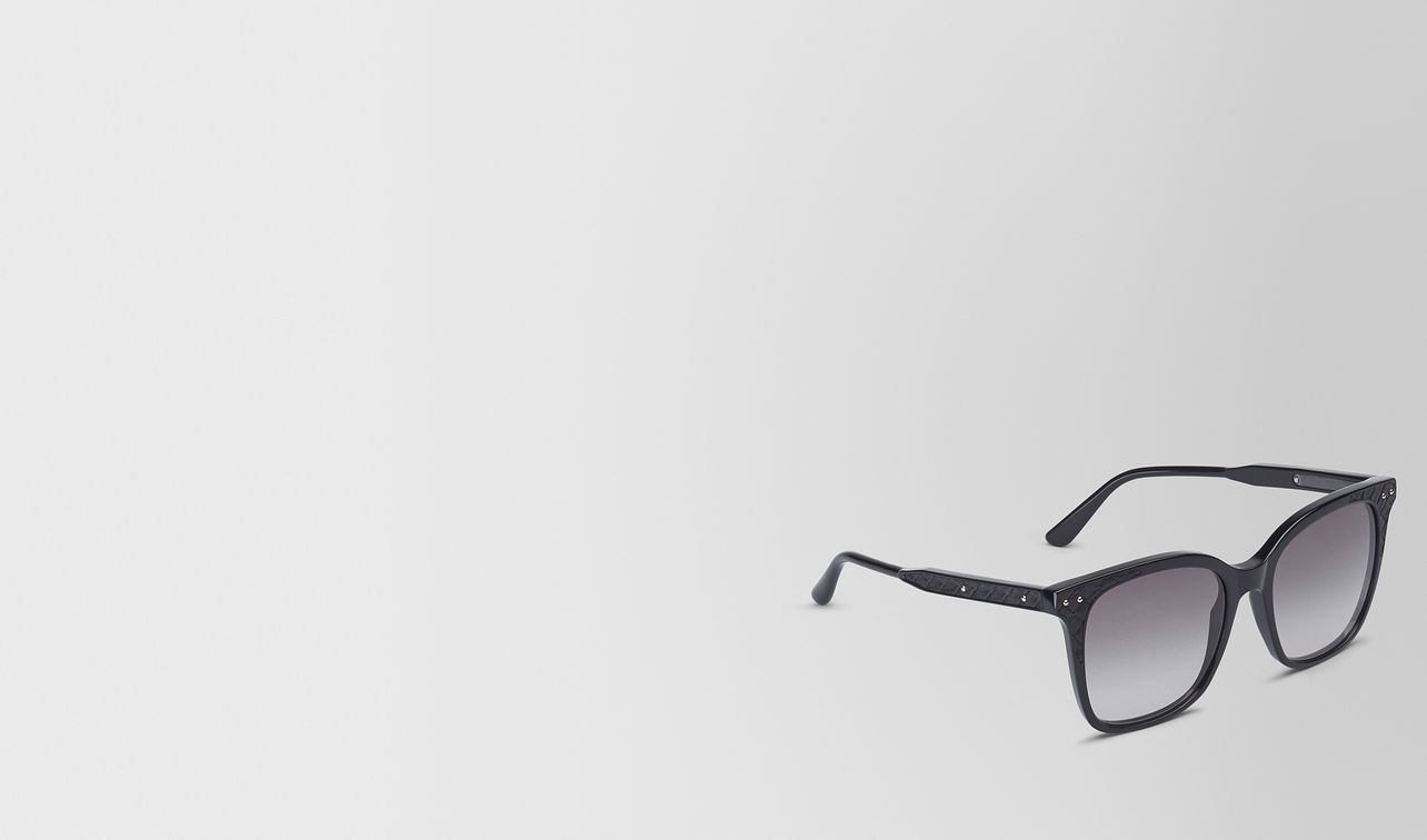 sunglasses in shiny black acetate and black leather nappa leather , gradient grey lens landing