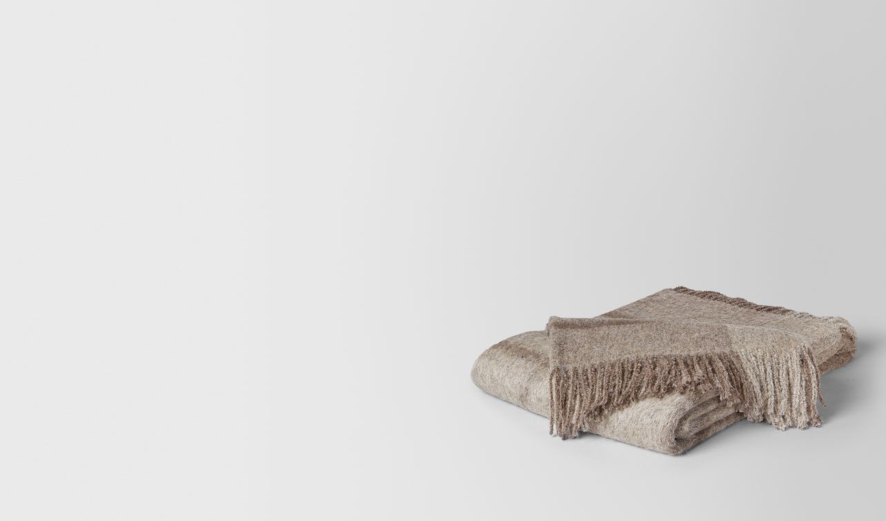 graphite medium grey alpaca and wool kaunis blanket landing