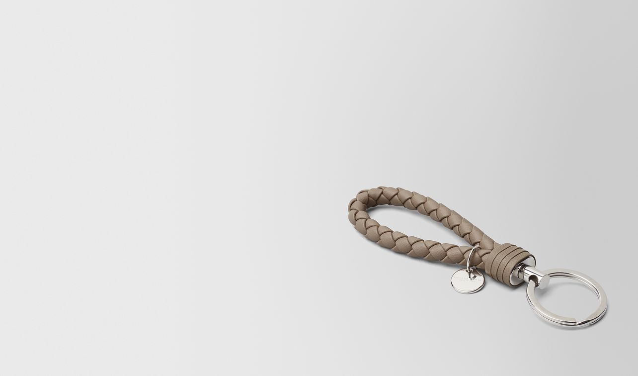 limestone intrecciato nappa key holder landing