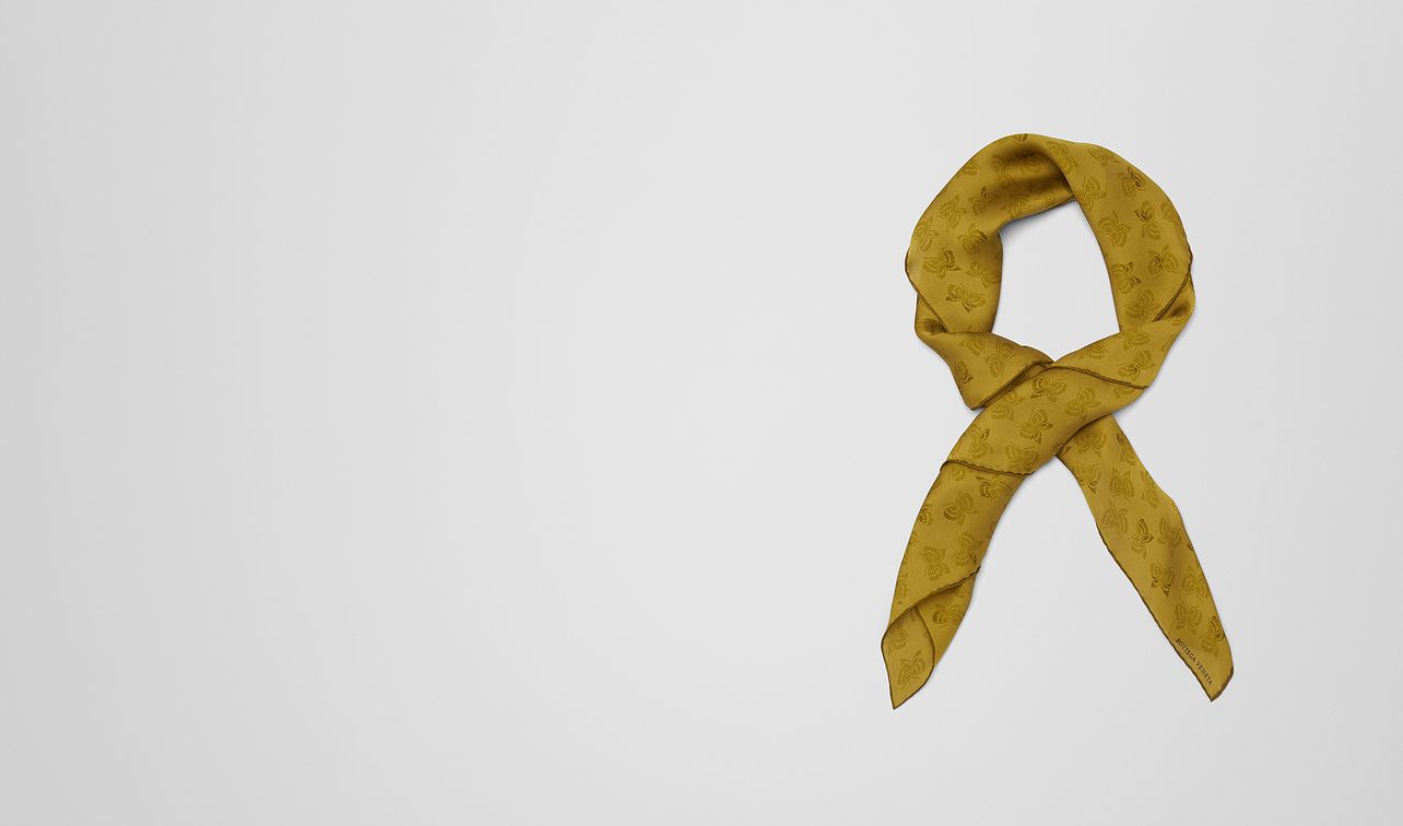 green silk scarf landing