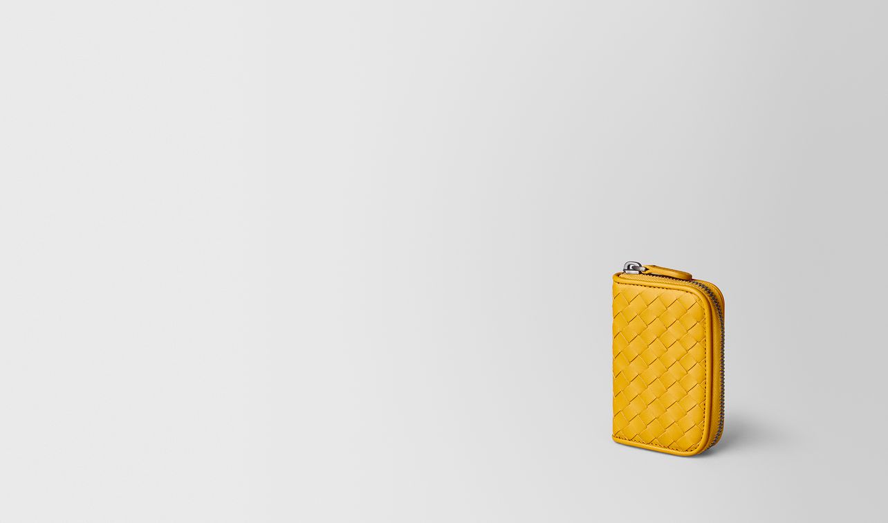 sunset intrecciato vn coin purse landing