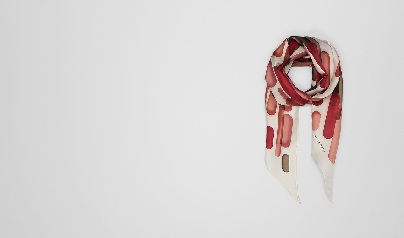 red silk scarf landing