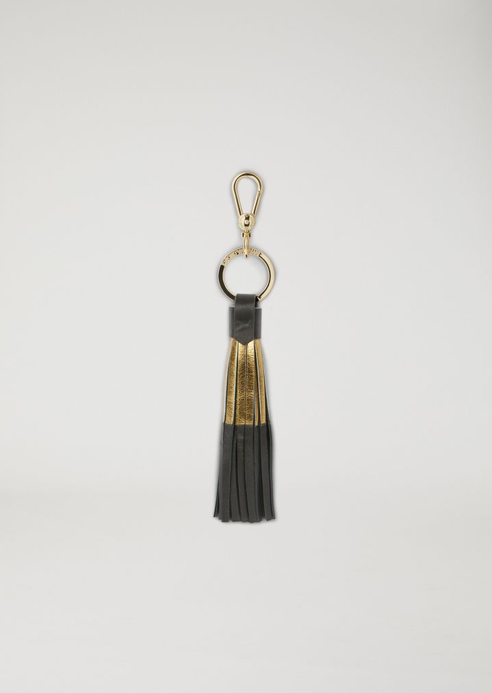 Llavero con borla de piel con detalle metalizado Llavero con borla de piel con detalle metalizado