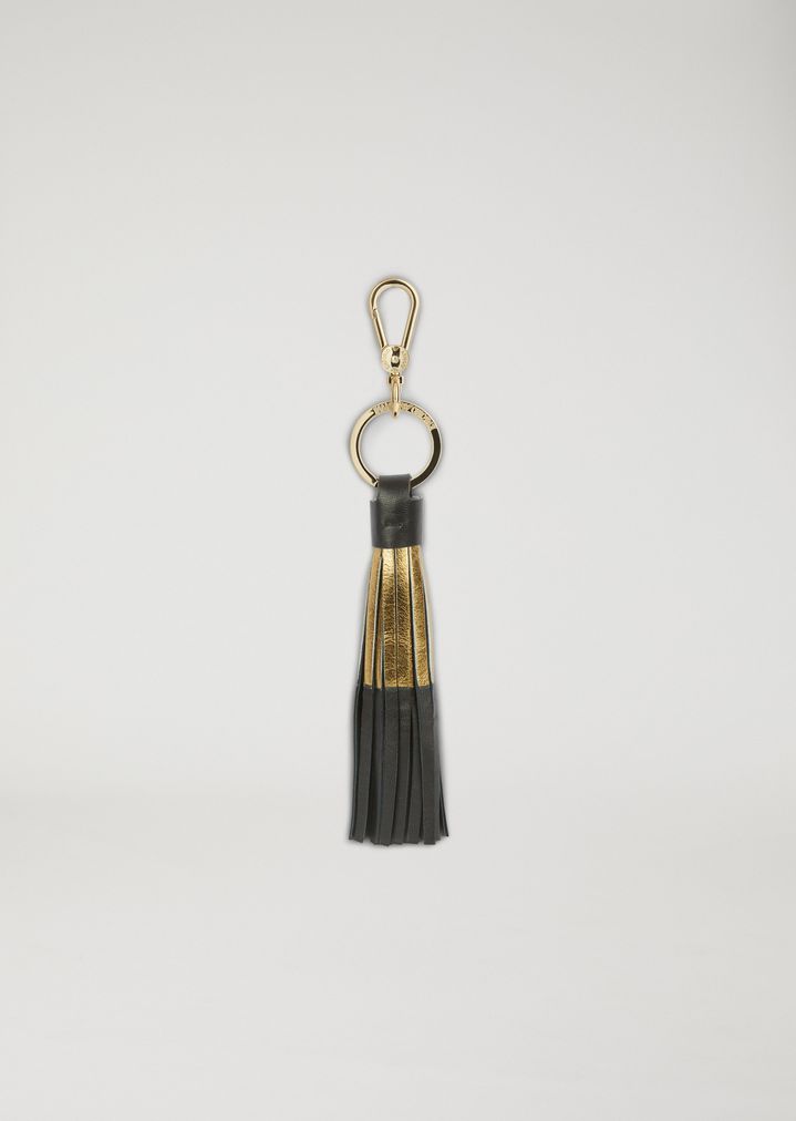 Llavero con borla de piel con detalle metalizado Llavero con borla de piel con detalle metalizado