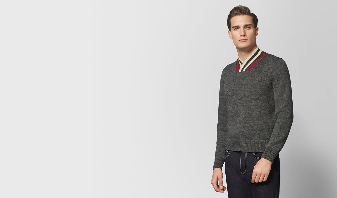 dark grey wool sweater landing