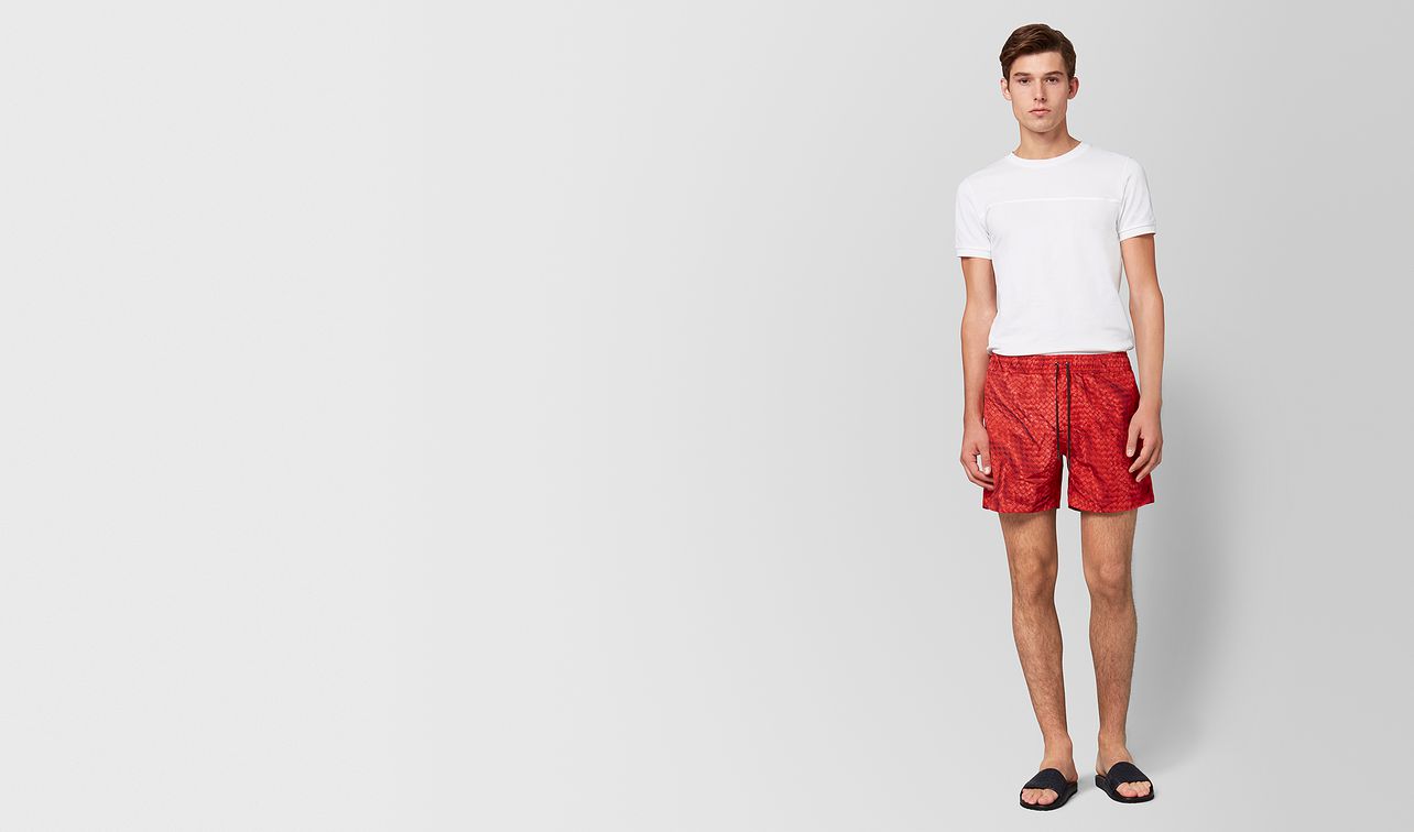 red polyester swimsuit landing