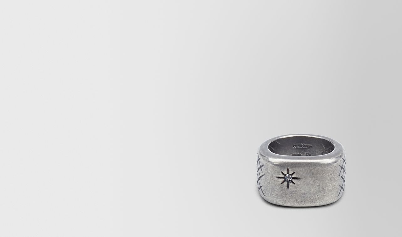 ring in silver and naturale cubic zirconia with intrecciato details landing