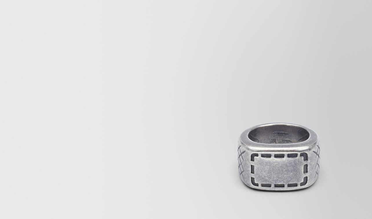ring in silver with selleria motif and intrecciato details landing