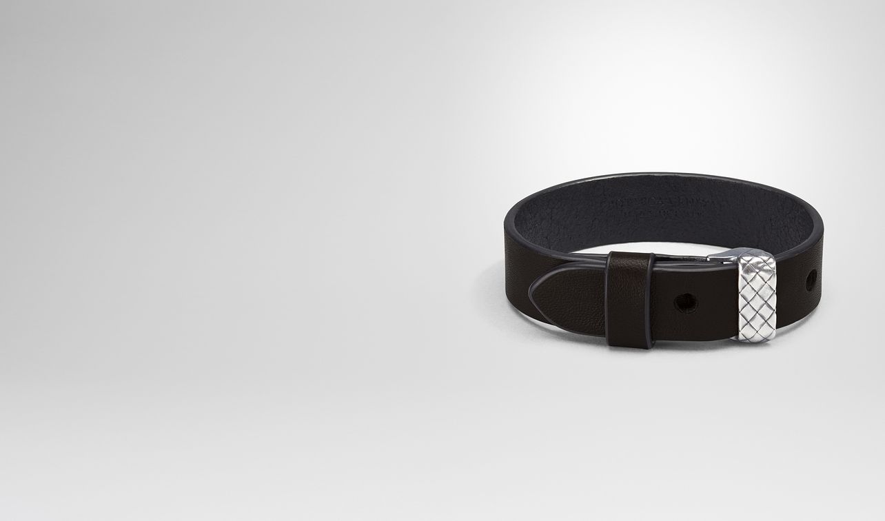 bracelet in espresso nappa and silver and cuir, intrecciato detail landing