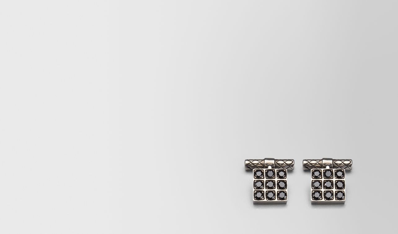 silver cufflink landing