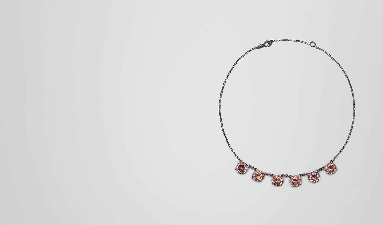 necklace in silver and naturale brown cubic zirconia, intrecciato detail landing