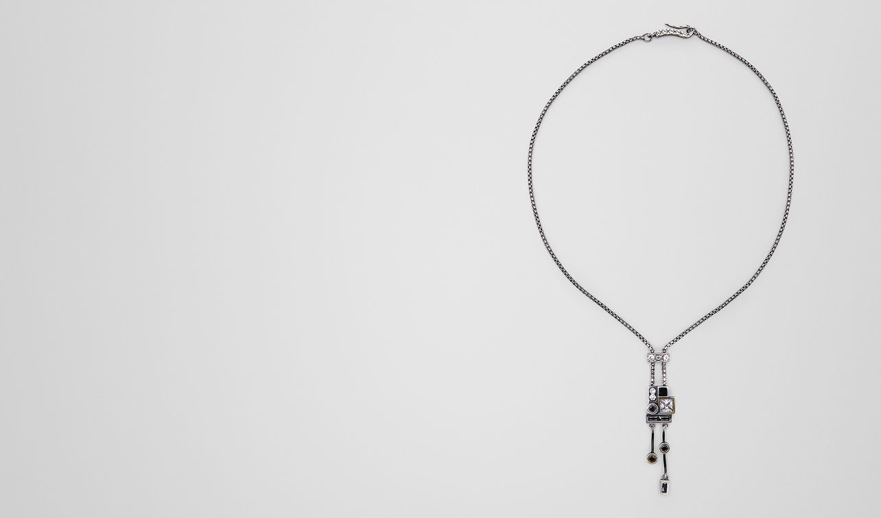 cubic zirconia/enamel/silver pendant landing