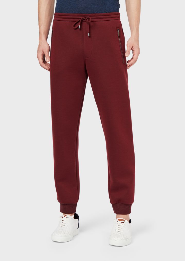 Jogginghose aus Jersey mit Tasche und China-Stickerei Jogginghose aus Jersey mit Tasche und China-Stickerei