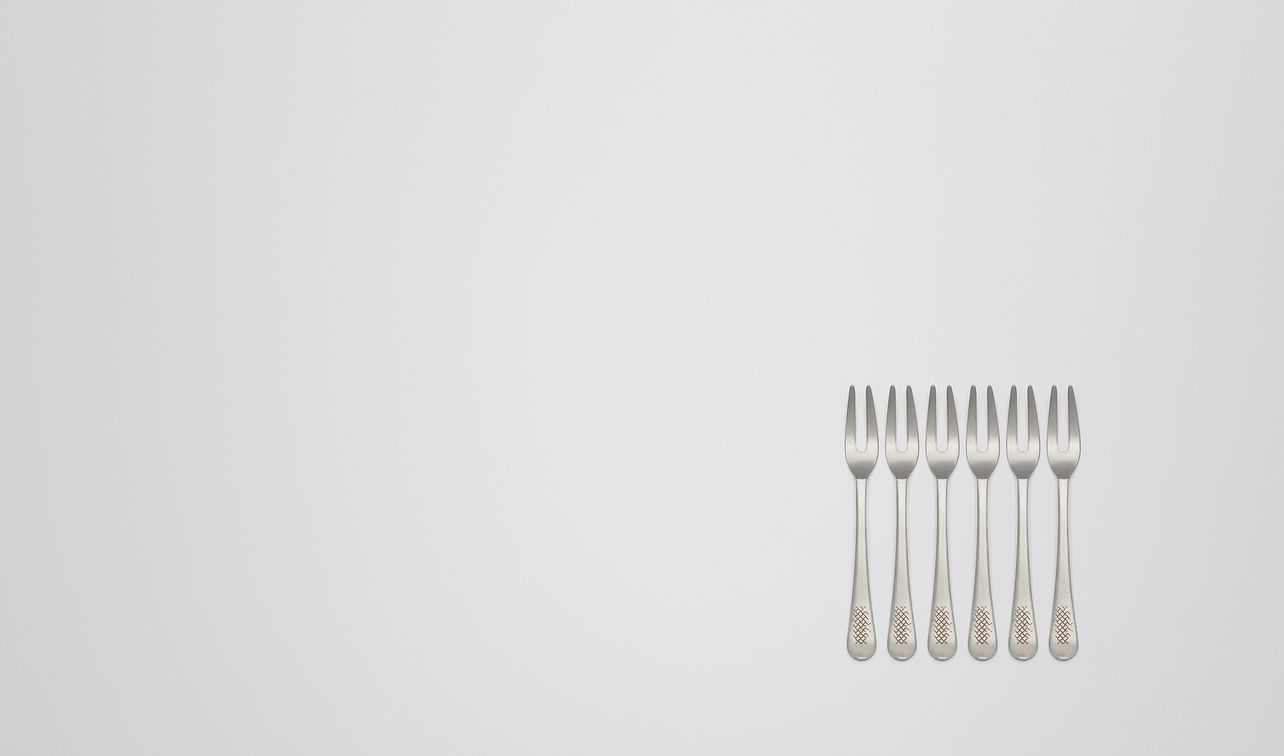 vintage stainless-steel escargot fork six-piece set landing