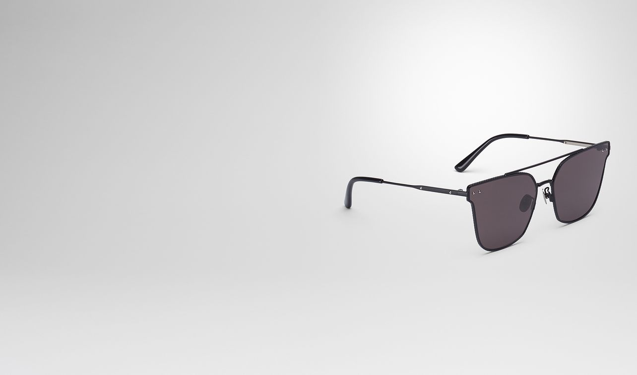 black metal sunglasses landing