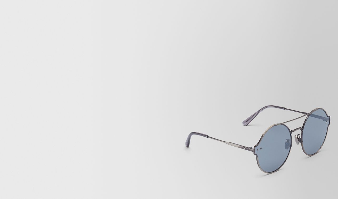 silver metal sunglasses landing